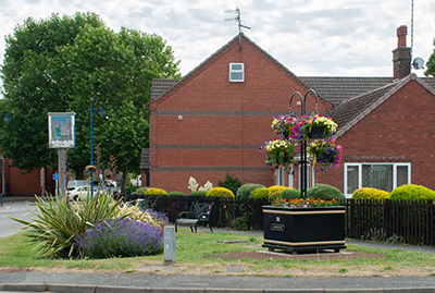 View of the Village Sign and Planter in Sandiacre